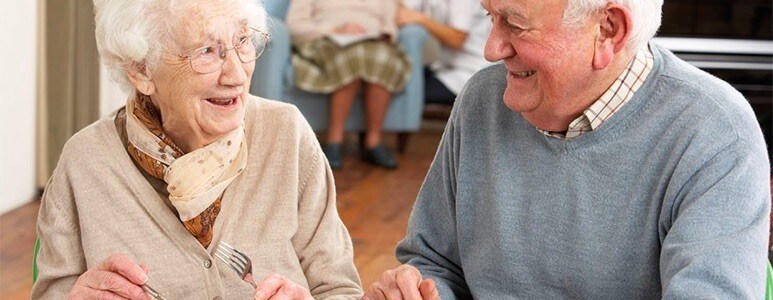 Residents having social interactions while dining Residents having social interactions while dining