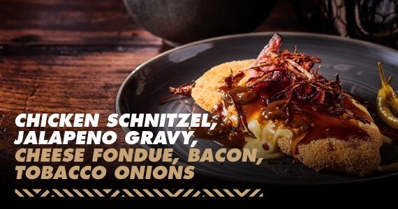 Chicken schnitzel, jalapeno gravy, cheese fondue, bacon, tobacco onions