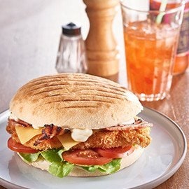 Chicken Schnitzel Turkish with Tomatoes, Bacon and Swiss Cheese Chicken Schnitzel Turkish with Tomatoes, Bacon and Swiss Cheese