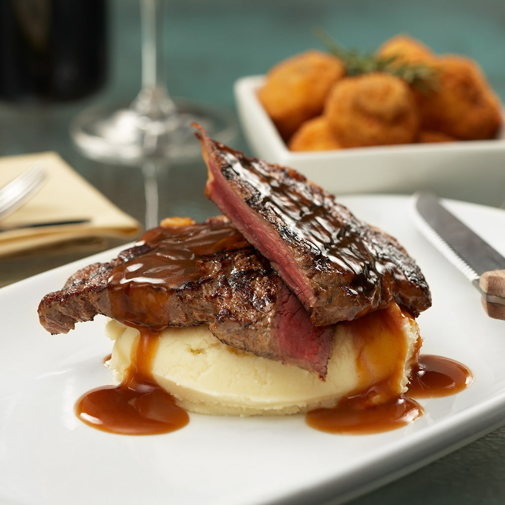 Char Grilled NY Steak with Garlic Mash, Rosemary Sauce and Crumbed Mushrooms Char Grilled NY Steak with Garlic Mash, Rosemary Sauce and Crumbed Mushrooms