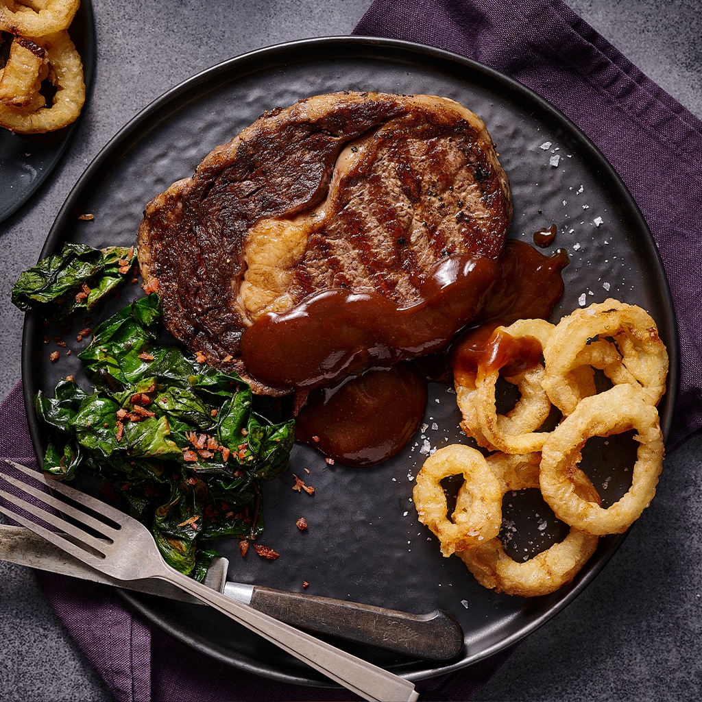 Scotch Fillet with Beer Battered Onion Rings and Chipotle Gravy Scotch Fillet with Beer Battered Onion Rings and Chipotle Gravy