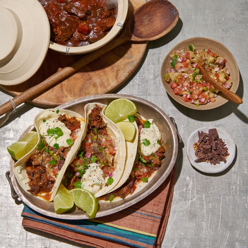 Slow-Cooked Adobo Beef Taco with Chilli Chocolate and Onion Crema Slow-Cooked Adobo Beef Taco with Chilli Chocolate and Onion Crema